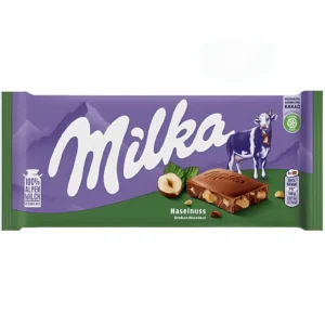 شکلات میلکا با مغز تکه‌ های فندق Milka Hazelnuts وزن 100 گرم